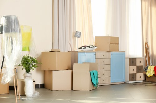 Staff preparing desks and workstations for an office move