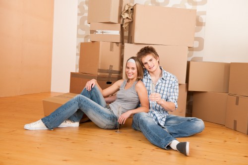 Packed boxes and protective wrapping prepared for flat removals in Hampstead