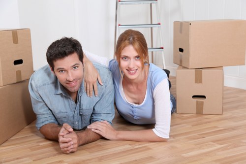 Organized Hampstead furniture storage space with labeled items and protective packing