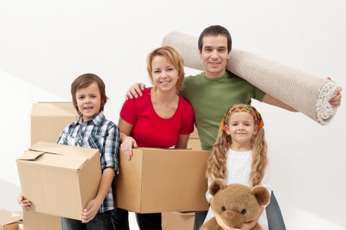 Professional movers handling furniture during a small removal in Hampstead